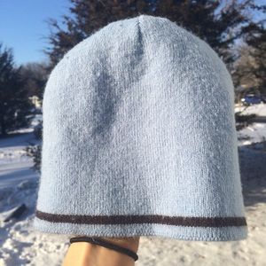 Blue ski hat with brown stripe